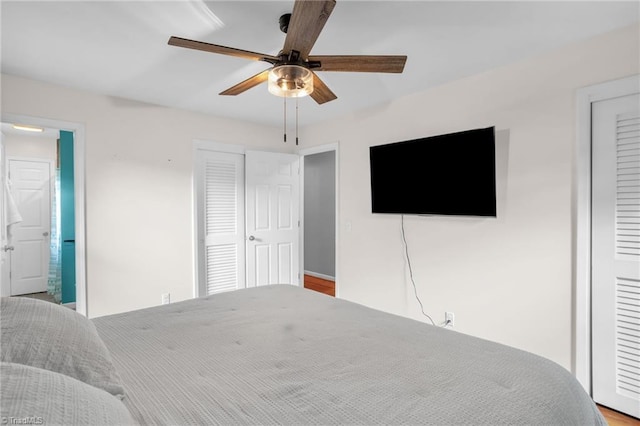 2703 W Cornwallis Dr, Greensboro, NC 27408 - bedroom with a closet and a ceiling fan