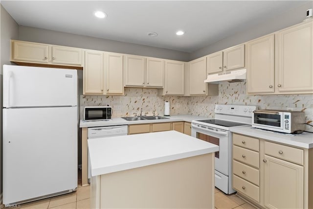2525 Halle Ann Cir, Winston-Salem, NC 27103 - kitchen with white appliances, under cabinet range hood, a sink, light tile patterned floors, and recessed lighting