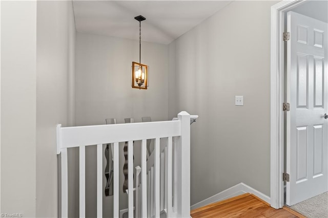 2525 Halle Ann Cir, Winston-Salem, NC 27103 - stairs with a chandelier, baseboards, and wood finished floors