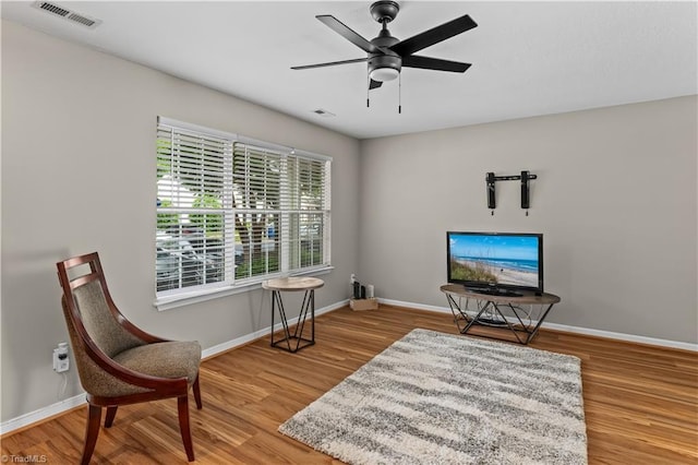 2525 Halle Ann Cir, Winston-Salem, NC 27103 - living area with wood finished floors, baseboards, and ceiling fan