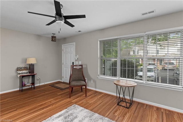 2525 Halle Ann Cir, Winston-Salem, NC 27103 - living area with baseboards, wood finished floors, and ceiling fan