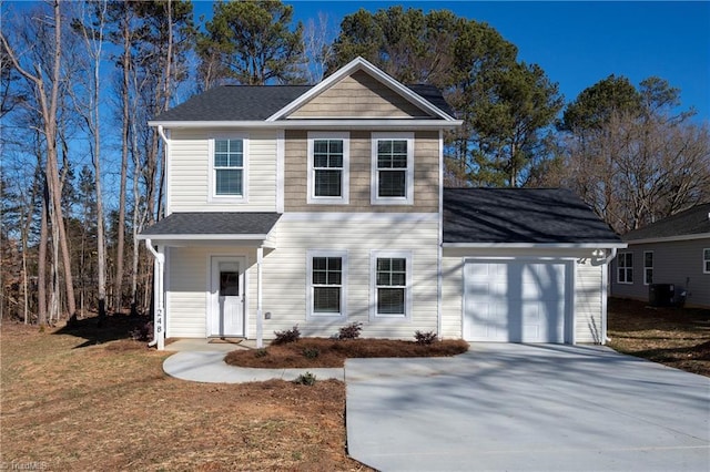 view of front property featuring a garage, a front lawn, and central air condition unit