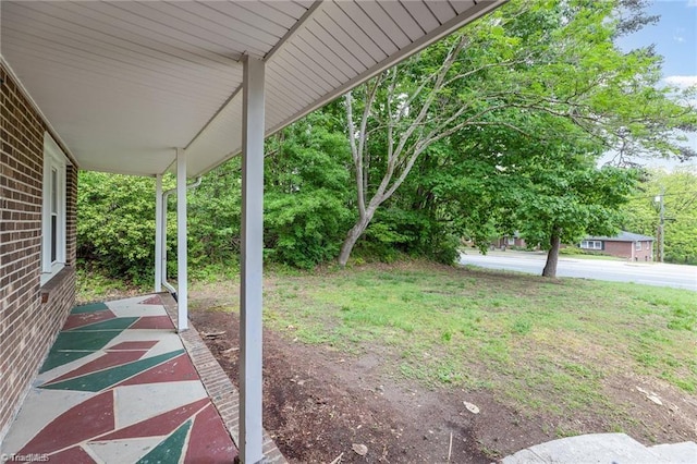 view of yard featuring a porch