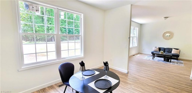 office featuring baseboards and healthy amount of natural light