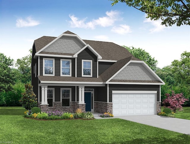 craftsman house featuring a garage and a front lawn