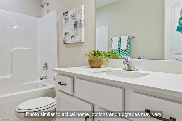 bathroom with toilet, shower / washtub combination, and vanity