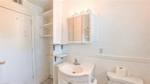 2914 Phillips Ave, Greensboro, NC 27405 - bathroom featuring toilet and vanity