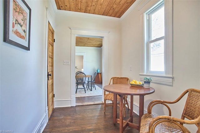 523 N Main St, Graham, NC 27253 - dining space with dark wood-type flooring, wooden ceiling, crown molding, and baseboards