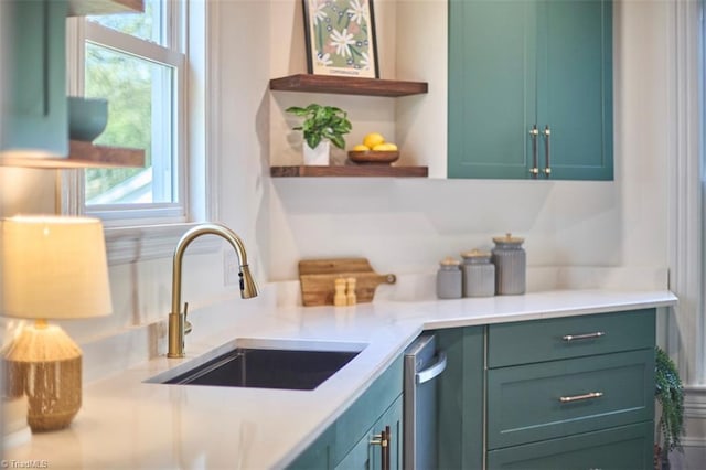 523 N Main St, Graham, NC 27253 - kitchen featuring light countertops, a sink, open shelves, and a healthy amount of sunlight