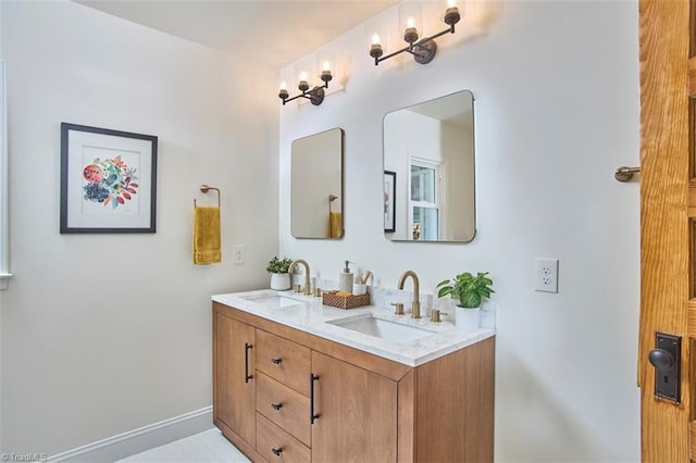 523 N Main St, Graham, NC 27253 - full bath featuring double vanity, baseboards, and a sink