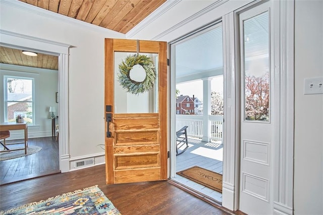 523 N Main St, Graham, NC 27253 - foyer with crown molding, wood ceiling, visible vents, and wood-type flooring