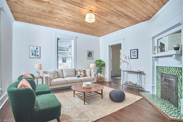 523 N Main St, Graham, NC 27253 - living room with ornamental molding, a tile fireplace, and wood ceiling
