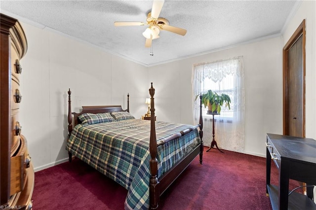 bedroom featuring a textured ceiling, carpet floors, a ceiling fan, and crown molding