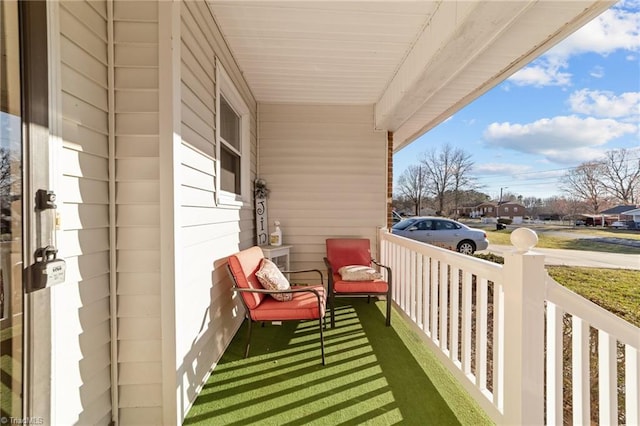 balcony featuring a porch