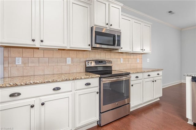 2403 Hammock Dr, High Point, NC 27265 - kitchen featuring stainless steel appliances, dark wood finished floors, backsplash, white cabinetry, and crown molding