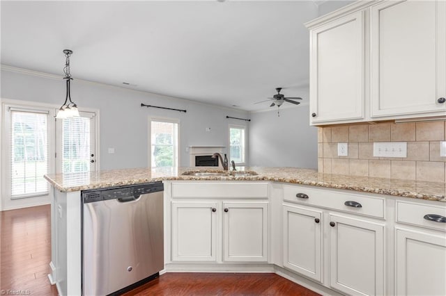 2403 Hammock Dr, High Point, NC 27265 - kitchen with stainless steel dishwasher, ceiling fan, ornamental molding, tasteful backsplash, and dark wood-type flooring