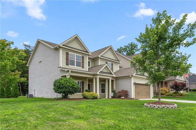 2403 Hammock Dr, High Point, NC 27265 - craftsman-style house featuring a front lawn, a garage, and a shingled roof