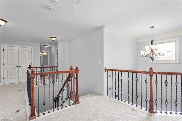 2403 Hammock Dr, High Point, NC 27265 - hall featuring an upstairs landing, carpet floors, a chandelier, and ornamental molding