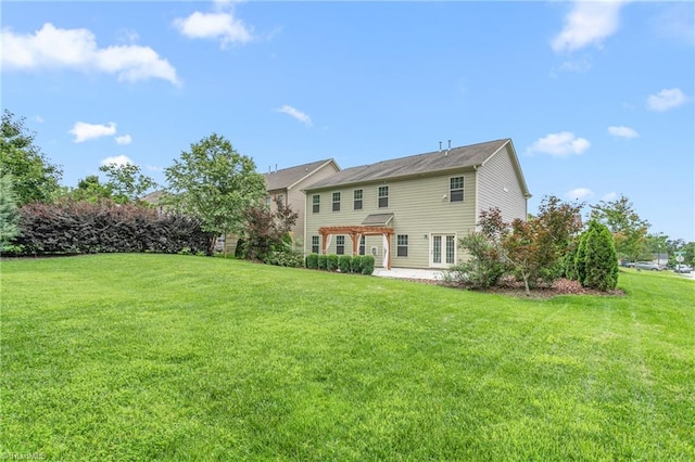 2403 Hammock Dr, High Point, NC 27265 - back of property featuring a yard and a patio area