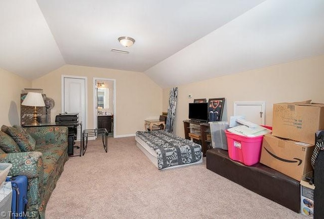 bonus room with lofted ceiling and carpet