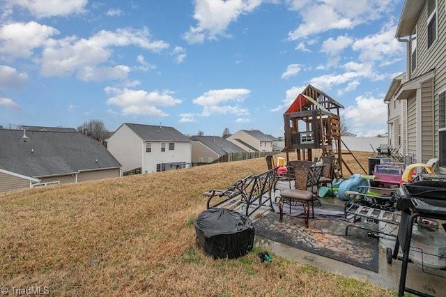 view of yard with a playground