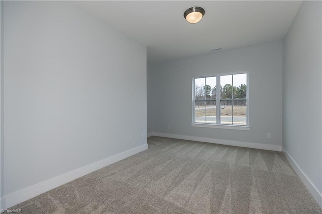 206 Cason Dr, Gibsonville, NC 27249 - spare room featuring carpet flooring and baseboards