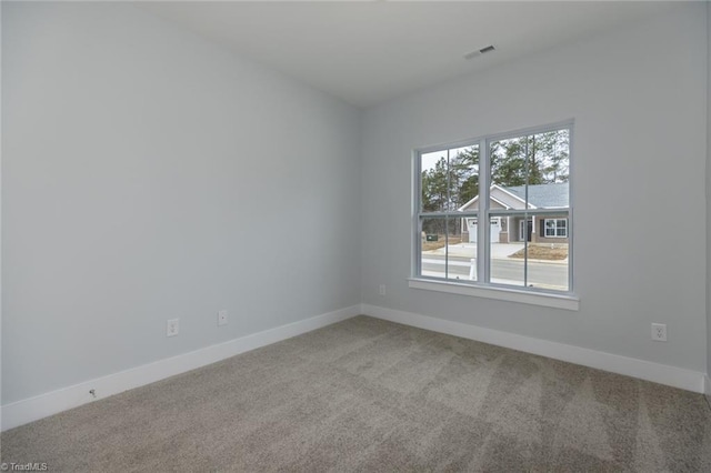 206 Cason Dr, Gibsonville, NC 27249 - carpeted spare room with baseboards