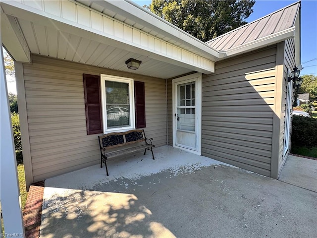 doorway to property featuring a patio