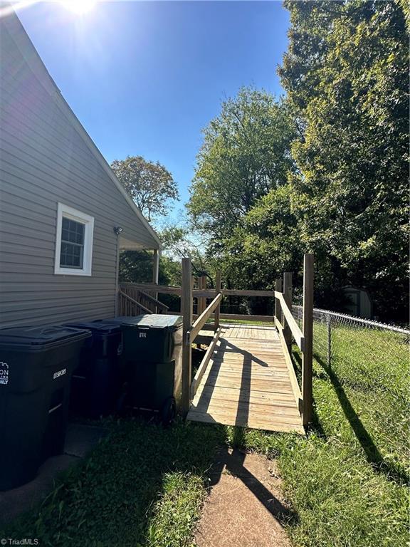 view of yard with a wooden deck