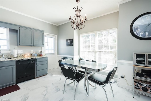 dining area with marble finish floor, wainscoting, crown molding, and a notable chandelier