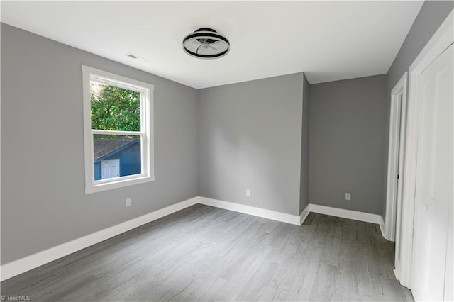 300 Center St, Thomasville, NC 27360 - unfurnished bedroom with wood finished floors and baseboards