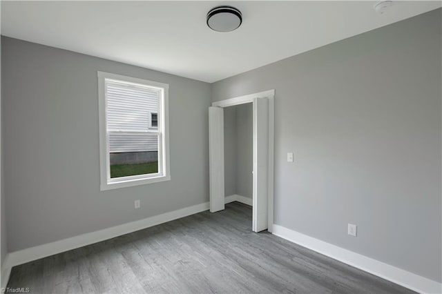 300 Center St, Thomasville, NC 27360 - spare room with wood finished floors and baseboards