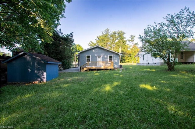300 Center St, Thomasville, NC 27360 - back of property with a lawn and a wooden deck