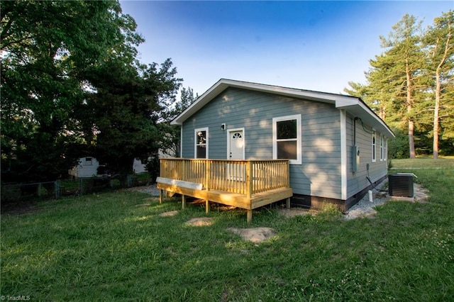 300 Center St, Thomasville, NC 27360 - back of property with cooling unit, crawl space, and a wooden deck
