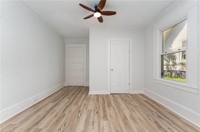 304 Louise Ave, High Point, NC 27262 - unfurnished bedroom with light wood finished floors, baseboards, ornamental molding, and ceiling fan