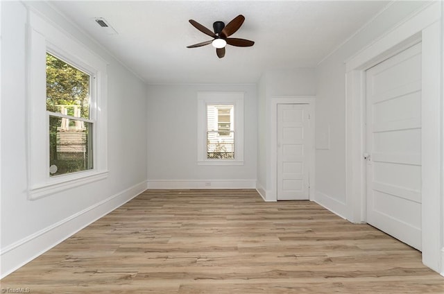 304 Louise Ave, High Point, NC 27262 - unfurnished bedroom featuring light wood finished floors, baseboards, ceiling fan, and crown molding