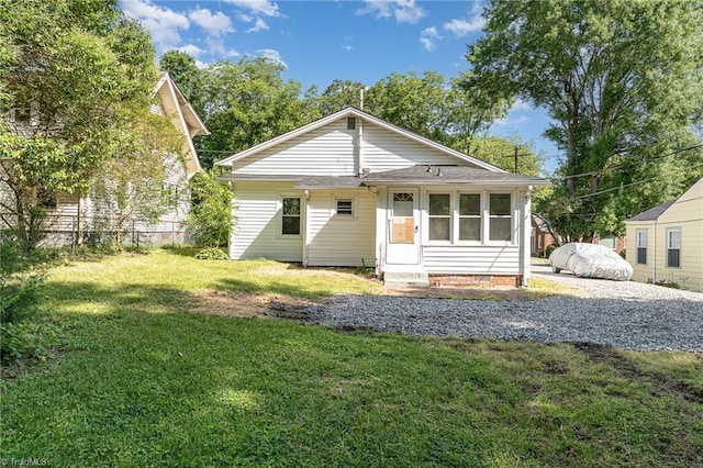 304 Louise Ave, High Point, NC 27262 - rear view of property with a lawn and entry steps