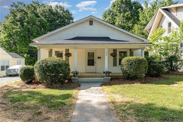 304 Louise Ave, High Point, NC 27262 - bungalow-style house with covered porch and a front yard