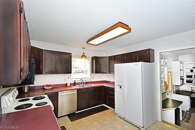 5467 Moravian Heights Ln, Clemmons, NC 27012 - kitchen with white appliances, light floors, dark countertops, a textured ceiling, and crown molding