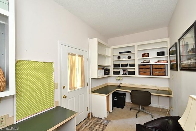 5467 Moravian Heights Ln, Clemmons, NC 27012 - office space with built in study area, a textured ceiling, and carpet floors