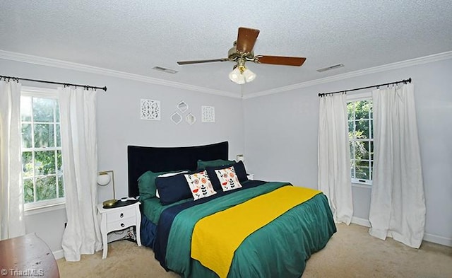 bedroom featuring multiple windows, light colored carpet, and ceiling fan