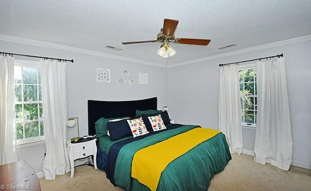 5467 Moravian Heights Ln, Clemmons, NC 27012 - carpeted bedroom featuring a textured ceiling, ornamental molding, and ceiling fan