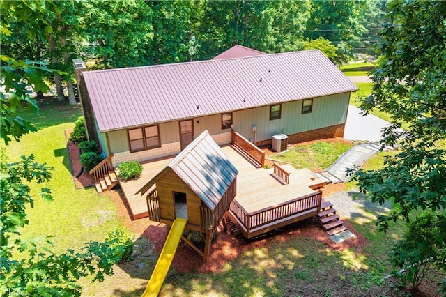 1625 Eagle Crest Dr, Pfafftown, NC 27040 - back of house with a wooden deck, metal roof, central AC unit, and a yard