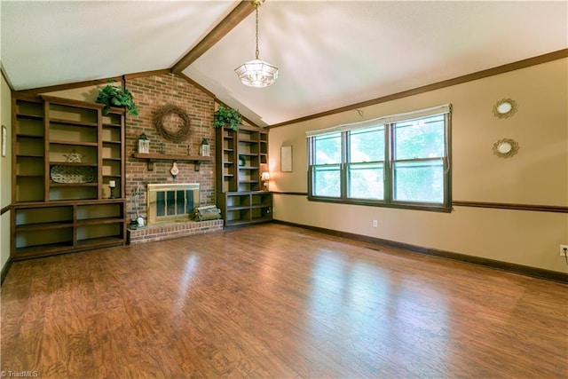 1625 Eagle Crest Dr, Pfafftown, NC 27040 - unfurnished living room featuring wood finished floors, a chandelier, baseboards, a fireplace, and crown molding