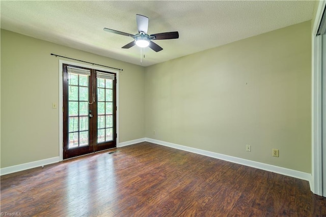 1625 Eagle Crest Dr, Pfafftown, NC 27040 - unfurnished room featuring french doors, dark wood finished floors, a ceiling fan, baseboards, and a textured ceiling