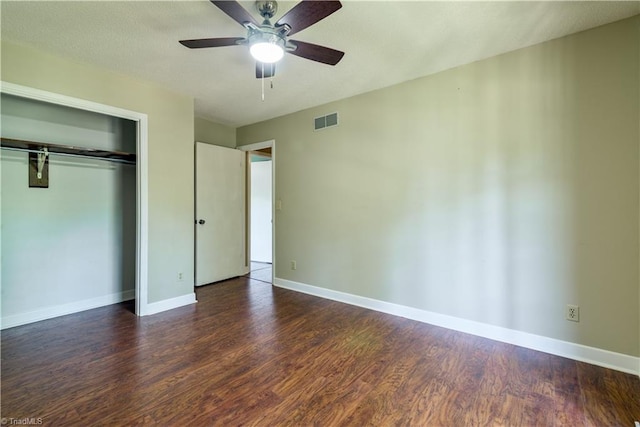 1625 Eagle Crest Dr, Pfafftown, NC 27040 - unfurnished bedroom with dark wood-style floors, a closet, baseboards, and a ceiling fan