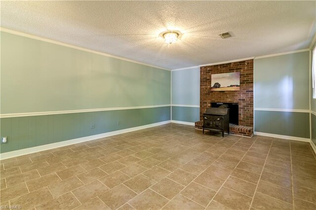 1625 Eagle Crest Dr, Pfafftown, NC 27040 - unfurnished living room with a textured ceiling, ornamental molding, and baseboards