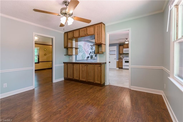 1625 Eagle Crest Dr, Pfafftown, NC 27040 - kitchen with white appliances, a ceiling fan, brown cabinetry, dark wood-style floors, and crown molding