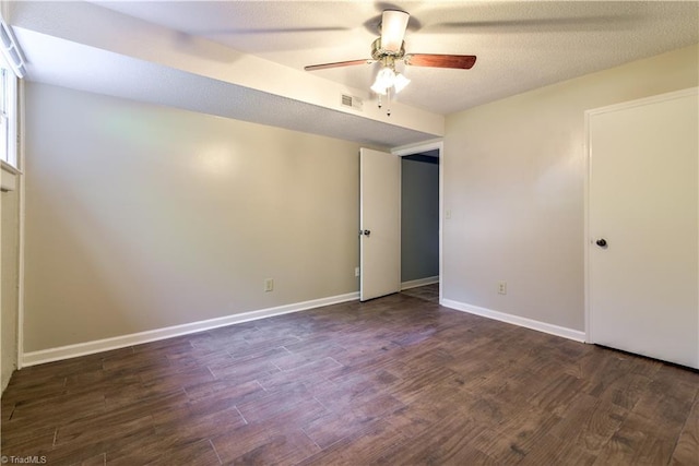 1625 Eagle Crest Dr, Pfafftown, NC 27040 - unfurnished bedroom with dark wood finished floors, baseboards, and ceiling fan