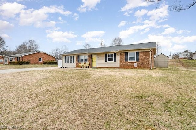 ranch-style house with a front lawn